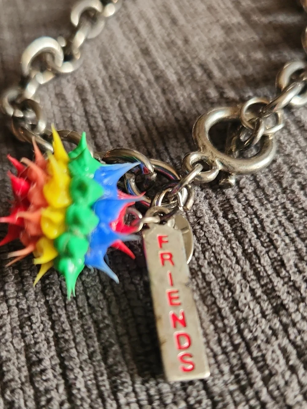 Claire's Silver Chain Bracelet with Rainbow Spike Charm and FRIENDS Tag